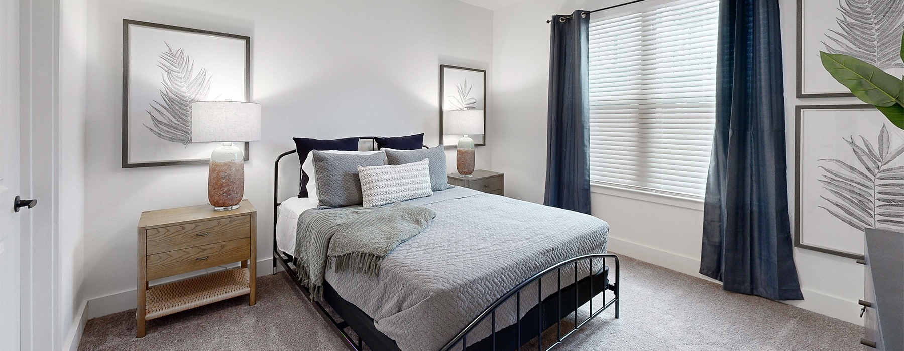 a bedroom with lots of natural light